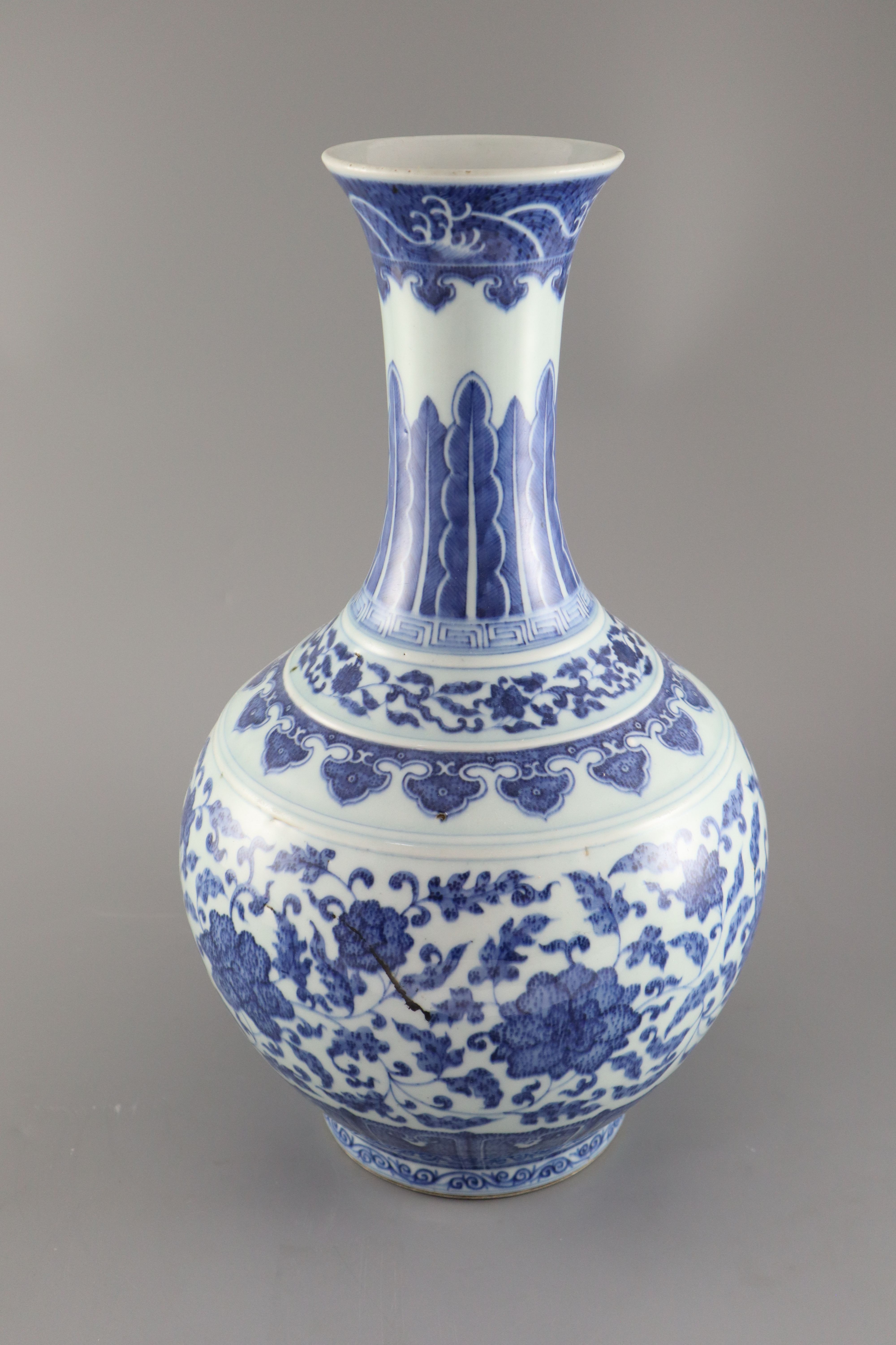 A Chinese blue and white Ming style bottle vase, Qianlong six character mark but later, 41.5cm high